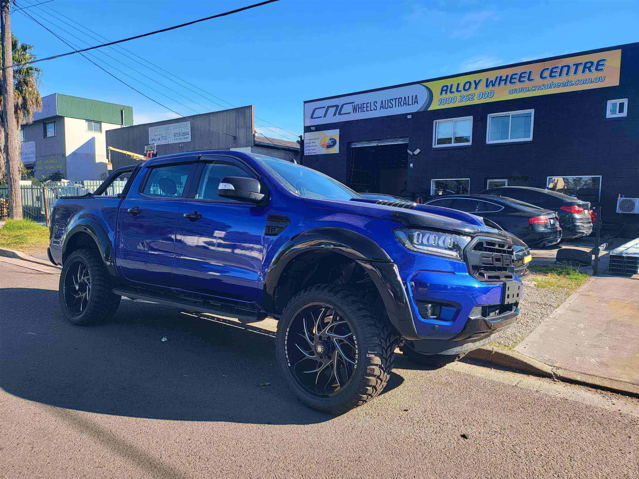 BLACK ROCK STRYKER GLOSS BLACK MILLED 22X10 6X139.7 WHEEL Wheel Zone